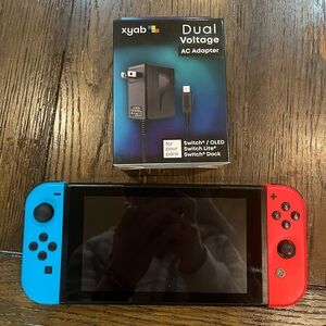 Nintendo Switch with NIB Dual Voltage Charger